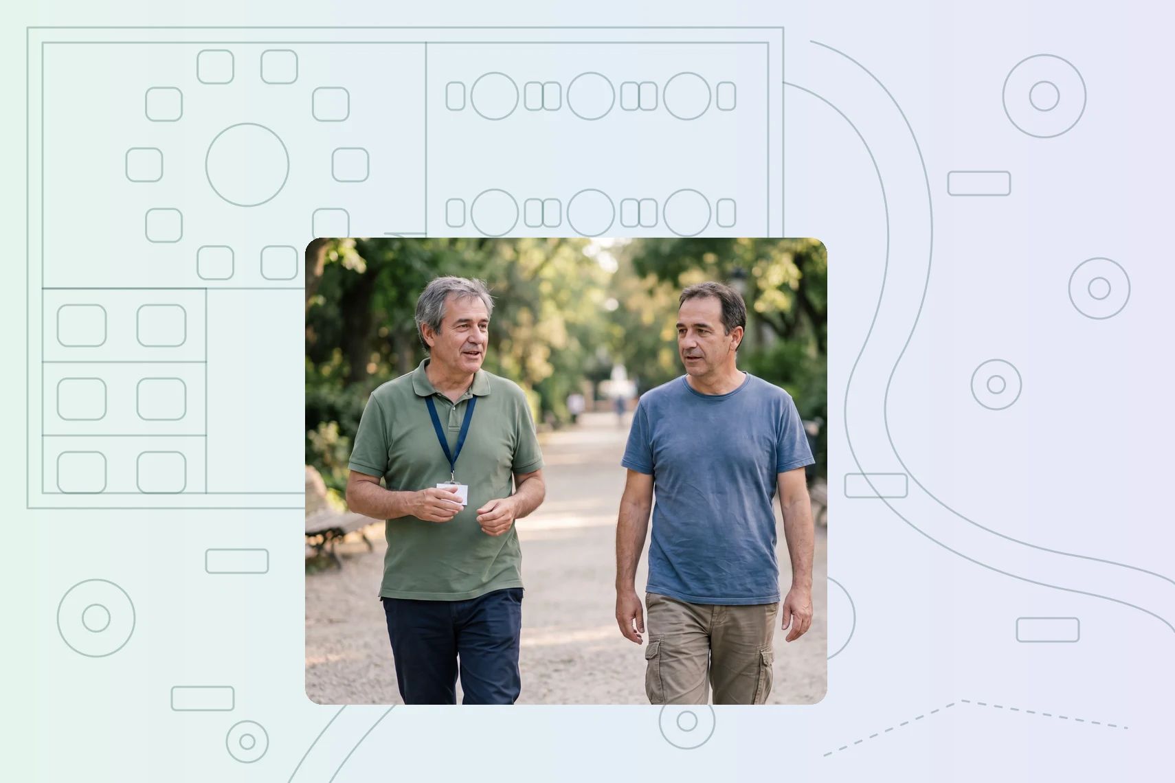 Support worker walking with client through park mid-conversation