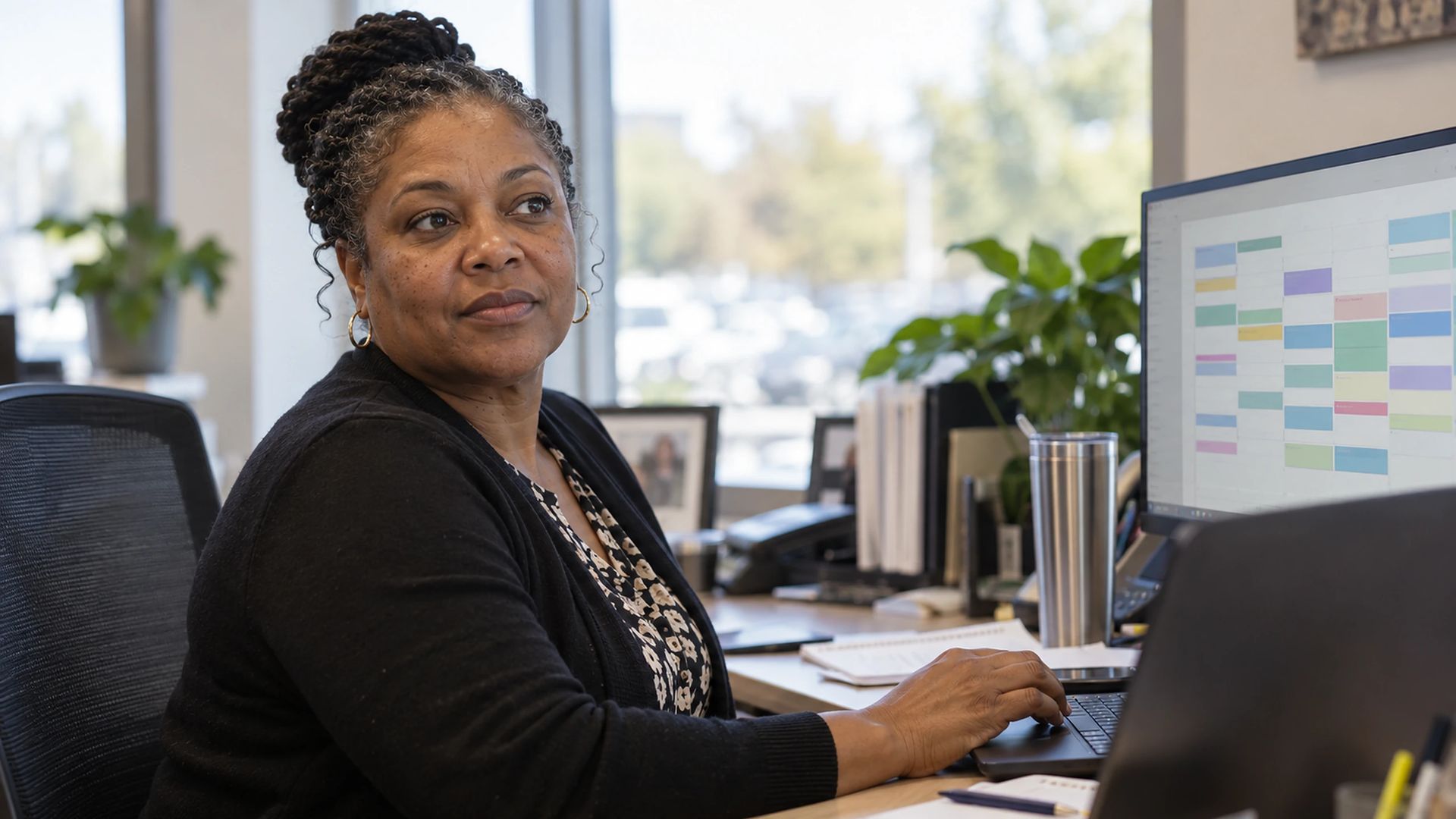 Office worker at a desk in a retail office