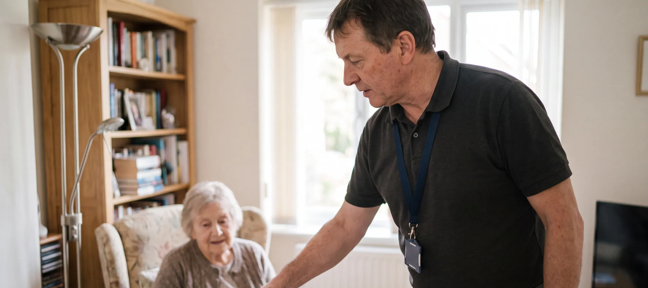 Occupational therapist visiting an older client in her living room